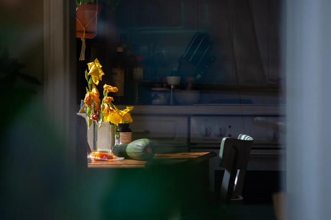 stressed patient looking at medical bills on kitchen table