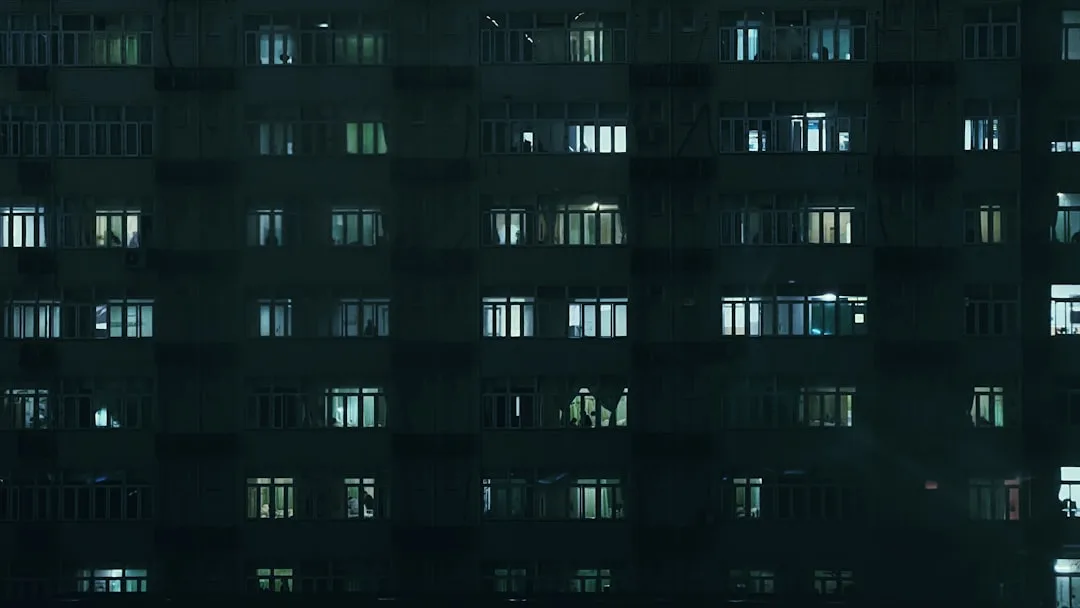 person looking out hospital window contemplative